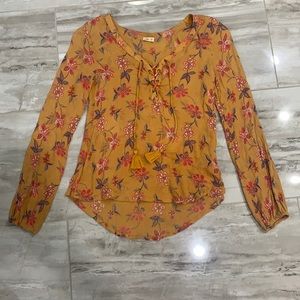 Hollister Yellowish orange floral shirt. Size XS.